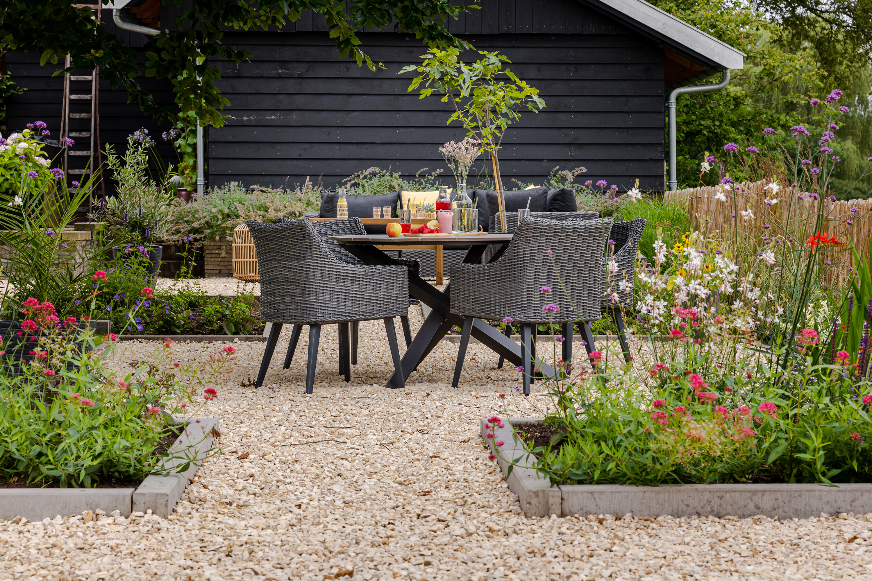 Hoe creëer ik een landelijke tuin? 