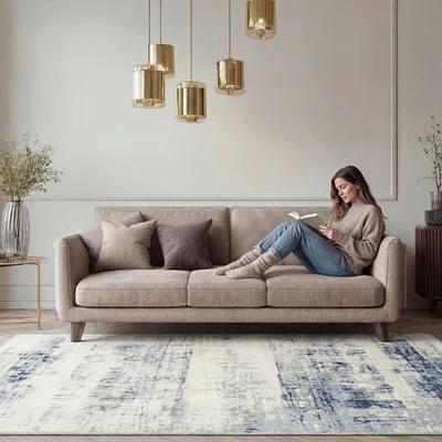 FLAID vloerkleed bij een bank in een modern interieur